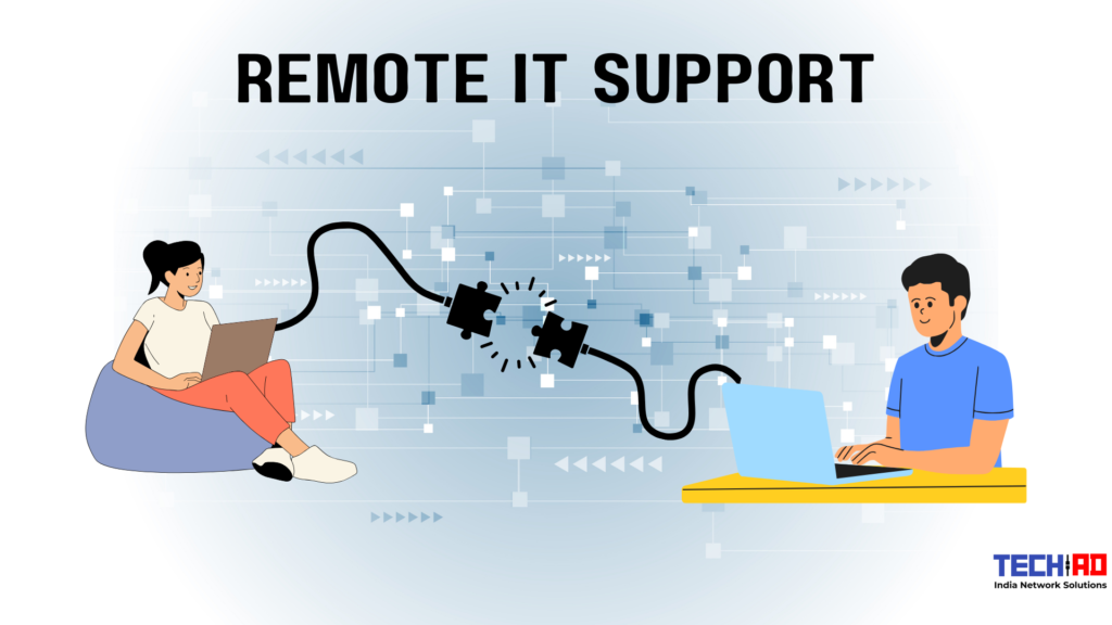 The image shows an illustration of remote IT support, with a person seated on a bean bag working on a laptop on the left, and another person working at a desk on a laptop on the right. A black cable with puzzle-piece connectors between them symbolizes the connection. The background features interconnected squares and arrows representing a network. At the top, the text "REMOTE IT SUPPORT" is prominently displayed, and in the bottom right corner, there's a logo that says "TECHAD India Network Solutions."